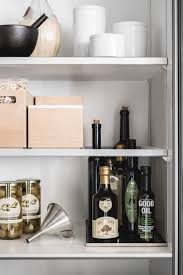 After putting in the effort to organize your kitchen cabinets, you have to make sure everyone in your household keeps them organized. Siematic Inside For Tall Wall And Base Cabinets Open To Many Things An Open Shelf E Aluminium Kitchen Open Plan Kitchen Dining Living Kitchen Organization