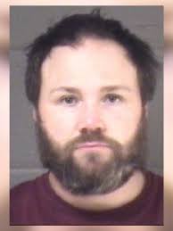 Man charged after weapons, vehicle stolen during home break-in, authorities  say