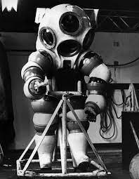 The Strange And Wonderful History Of Diving Suits From 1715 To Today Diving Suit Atmospheric Diving Suit Diving