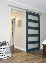 Plans for our diy barn doors. Diy Modern Sliding Door With Frosted Glass Panels