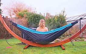 Wouldn't you like a hammock with a super smooth surface that provides comfort and remains cool even in hot weather? Hot Tub Hammock The Hydro Hammock Is A Portable Hot Tub Thesuperboo