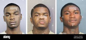 This combo of photos provided by the Broward County Sheriff's Office shows,  from left, Michael Boatwright, Dedrick Williams, and Trayvon Newsome. A  Florida jury has convicted the three men of murder in