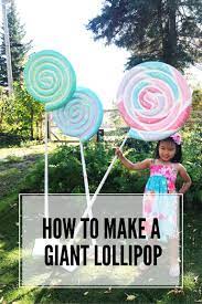 3) punch your candy through. How To Make A Giant Lollipop Candy Christmas Decorations Giant Lollipops Gingerbread Christmas Decor