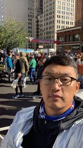 Seeking newspaper with friend's name after half-marathon