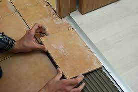 Get free 2 day shipping on qualified wood laminate transition strips products or buy flooring when the transition from tile to laminate is under the door you have to make sure you will install it parallel with the door as to obtain a nice effect. Transition From Tile To Laminate Howtospecialist How To Build Step By Step Diy Plans Carpet Tiles Design Transition Flooring Diy Plans