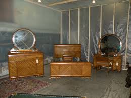 The art deco designs really stand out against the rich, dark gray. Antique Waterfall Bedroom Furniture Bedroom Furniture Ideas