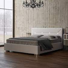 Letto matrimoniale contenitore moderno di design parisina bianco rivestito in ecopelle per materasso da 150x190cm con luci led multicolore. Valena Letto Matrimoniale Con Contenitore In Similpelle Bianco Con Luci A Led Collyshop