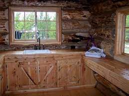 Fixtures, sink, flooring, even the kitchen cabinets. Log Cabin Style Mobile Homes Well Rounded Walls On Wheels Small Cabin Kitchens Log Cabin Kitchens Cabin Kitchens
