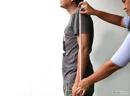 Run the measuring tape over your shoulder, and let it hang down to your hand. How To Measure Your Neck Size And Sleeve Length Dress Shirt Sleeves Made To Measure Shirts Mens Shirt Dress