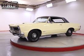 Image result for Canary Yellow 1965 AC Cars