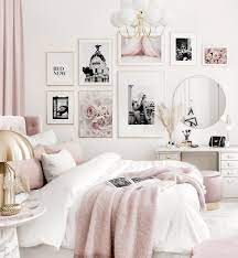 We opted for peachy pink walls in this room—plus a rug in a similar tone—which creates a warm, cozy glow. Elegant Gallery Wall Pink White Bedroom Black And White Posters Golden Frames Zimmer Einrichten Jugendzimmer Zimmer Gestalten Zimmer