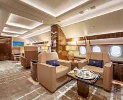 Business travel concept.generic design of white luxury private jet flying in blue sky at sunset.uninhabited desert. Luxury Private Plane Custom Jet Design Trends Voyage