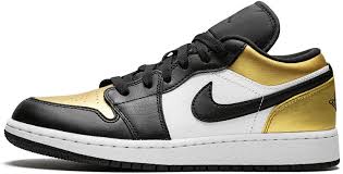 This air jordan 1 resembles that of the air jordan 1 mid that released in 2003. Amazon Com Jordan Air 1 Low Gs Metallic Gold Black White Sneakers