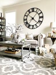 Keep square footage without sacrificing seating by using though the palette of blue, tan leather, grey and black is striking and far ahead taking into account an slate and copper living room wall decor ideas. 40 Unique Wall Decor Ideas With Clocks Wall Clocks Living Room Living Room Grey Living Room Clocks