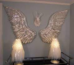 The perfect place to show off a small picture frame, terrarium, or even a retro figurine, an accent shelf brings added dimension to your wall. 30 Angels In Disguise Ideas In 2021 Wings Angel Decor Angel Wings Wall Decor