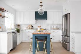 How to buy a kitchen cabinet? Blue Range Hood And Center Island Transitional Kitchen