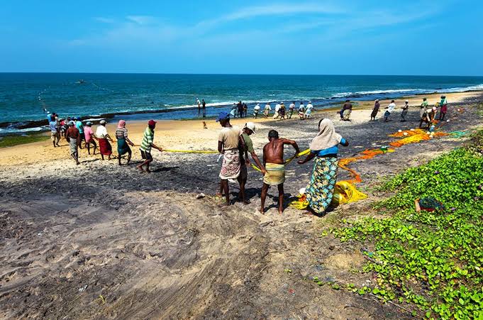 Yaddehimulla fishing village outrigger catamaran oruva south coast authentic working community west Unawatuna Sri Lanka