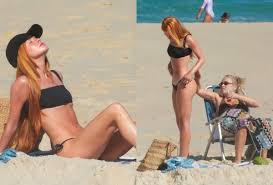 Marina Ruy Barbosa curte domingo de praia ao lado dos pais e aproveita dia no Recreio, no Rio; fotos