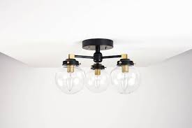 Mid century italian barovier murano glass floral flush mount ceiling light. Semi Flush Matte Black And Raw Brass 3 Clear Globe Mid Century Semi Flush Ceiling Lights Flush Ceiling Lights Ceiling Lights