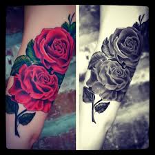 Black And Purple Roses Red And Black Roses Tattoos On Biceps Tattooshunt Com Black Rose Tattoos Rose Tattoos For Men Purple Rose Tattoos