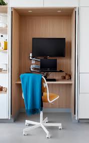 Update your kitchen with our selection of kitchen cabinets from menards. A Small Home Office Is Hidden Within These Minimalist White Kitchen Cabinets