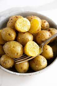Gently toss the potatoes with the butter, 1 teaspoon kosher salt, the pepper, the garlic powder, and. Garlic Butter Boiled Potatoes Recipe How To Boil Potatoes The Forked Spoon