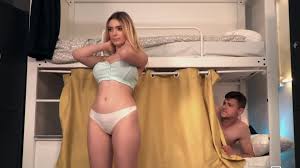 She looks back seductively before her next scene