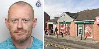 Drunk dragged pregnant shop worker over till in attempted robbery