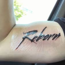 My First Tattoo It Says Reborn From Favorite Song By Kids See Ghost Kid Cudi And Kanye Cudi Favorite Ghost Kany Kanye Tattoo Kid Cudi Tattoos Tattoos