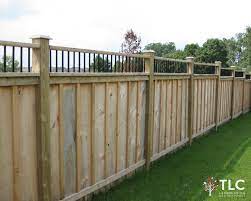 You can use cedar boards as a lap siding, cut into shingles, or lay vertically as board and batten. Board Batten Fence With 6x6 Posts Metal Detail Top Backyard Fences Backyard Fence Decorations Ideas