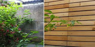 Gartenmauer Mit Holz Verkleiden Statt Hasslicher Betonsteine Schone Larchenverkleidung A View In The Garden Gives In 2020 Garden Wall Concrete Blocks Diy Fence