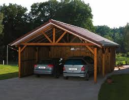 The ease of assembly for wooden ports helps to make these more affordable than the metal type. Carport With Attached Storage Diy Carport Carport Sheds Wooden Carports