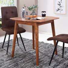 While lending a classic feel and adding a timeless look that your kitchen deserves, boconcept's dining table and chairs range could serve as the perfect fit for all tastes, styles, and spaces. Buy Solid Wood 2 Seater Eva Dining Table Online In India Latest Dining Sets Collection Saraf Furniture