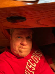 Would you say that a desk is a kind of table, or a piece of furniture  similar to a table? a. a kind of table