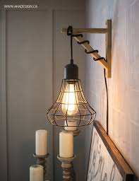 Hanging Cage Light From A Plug In Light And A Wood Bracket Bedroom Lighting Design Cage Light Elegant Bedroom
