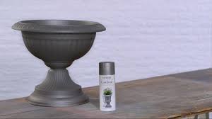 Cheap plastic planters turned into stone planter with spray paint. How To Spray Paint A Plastic Planter Youtube