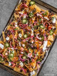 Spicy Baked Black Bean Nachos Recipe Budget Bytes Recipe Nachos Recipe Bean Nachos Mexican Food Recipes