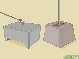 Staking your favorite canopy tent into the grass is an easy task. 3 Ways To Hold Down A Canopy Tent On Concrete Wikihow