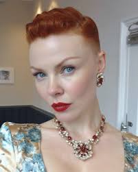 Wore once, maybe twice got it for a wedding. Flattering cut. 6/8 fit. Pick  up Sans Souci