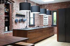 Walnut cabinets add warmth, a scalloped backsplash boosts character, and a spacious island is perfect for the entire family to congregate around. Black Walnut Cabinets Houzz