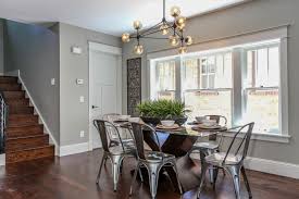 Staging a dining room is an important part of making your house look beautiful, inviting, and enticing for sale. Mid Century Modern Style Home Staging Design By White Orchid Interiors