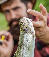 999 Guy Fish Hand Stock Photos