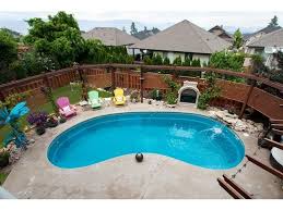 Time To Think Small The Leisure Pools Tuscany Composite Fiberglass Swimming Pool Comes In A 23 Foot Size Allowin Leisure Pools Small Pools Swimming Pools