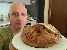My homemade using a whole wheat sourdough, spinach,olives, tomato and  cheese.
