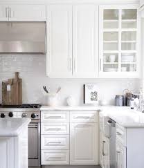 Add interest to your white cabinets with. White Glazed Tiles In White Kitchen Transitional Kitchen
