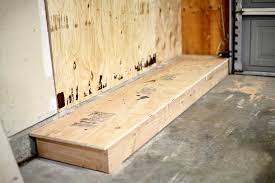 Shimming up a cabinet to make it level and plumb is much easier than cutting the bottom to make it fit square and flush. How To Build Diy Garage Cabinets And Drawers Thediyplan