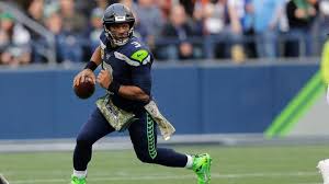 Russell carrington wilson (born november 29, 1988) is an american football quarterback for the seattle seahawks of the national football league (nfl). Russell Wilson Named Co Owner Chairman Of Nfl Flag Komo