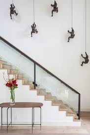 Seven Creative Ways To Design A Stairwell Staircase Wall Decor Stair Wall Decor Modern Wall Decor