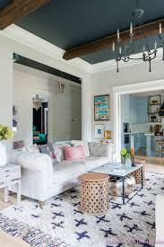 A Guide To Saving Big On All Things Anthropologie Home Addison S Wonderland Living Room White Rugs In Living Room Blue Living Room