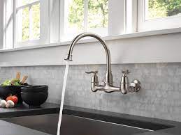You can buy with confidence, knowing that peerless backs this faucet with a lifetime limited warranty. Two Handle Wall Mounted Kitchen Faucet 22722lf Ss Delta Faucet